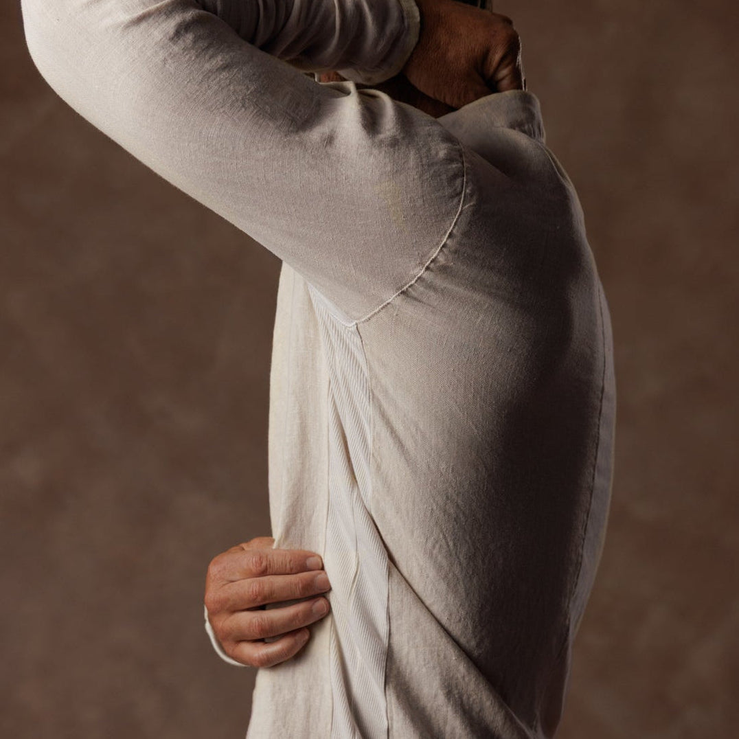 male modeling linen shirt in white stone