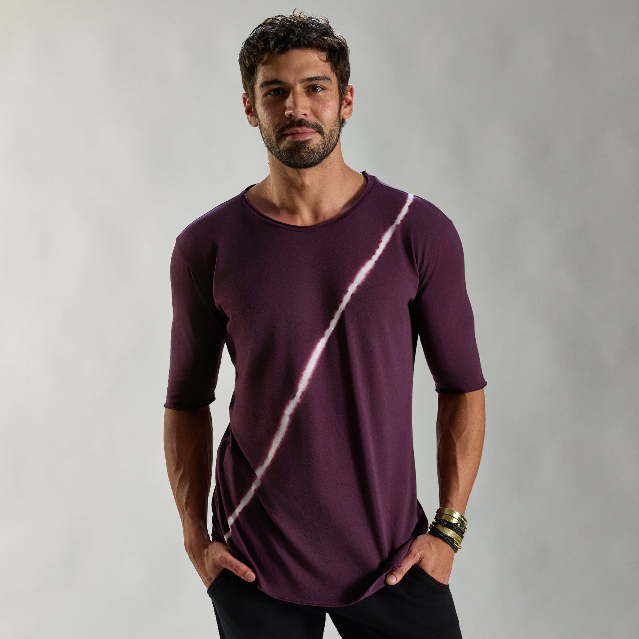 Male modeling purple bolt crew neck shirt