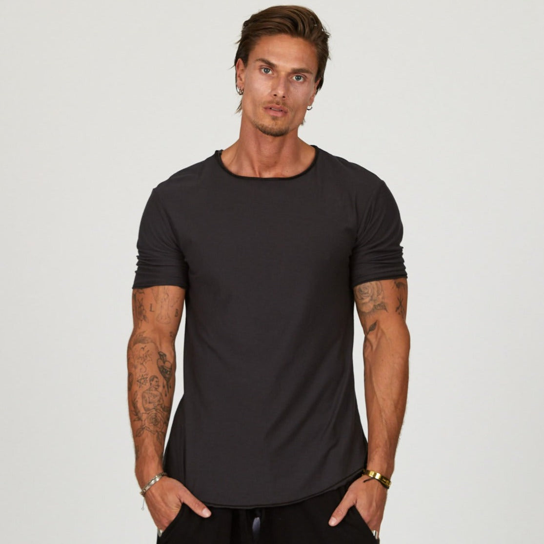 Male modeling grey crew neck shirt