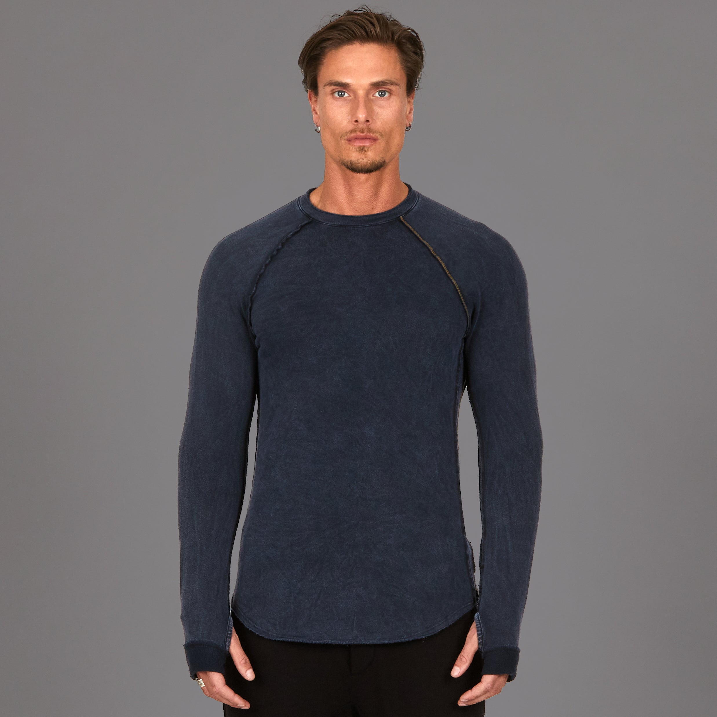Male modeling dark blue mineral wash long sleeve raglan