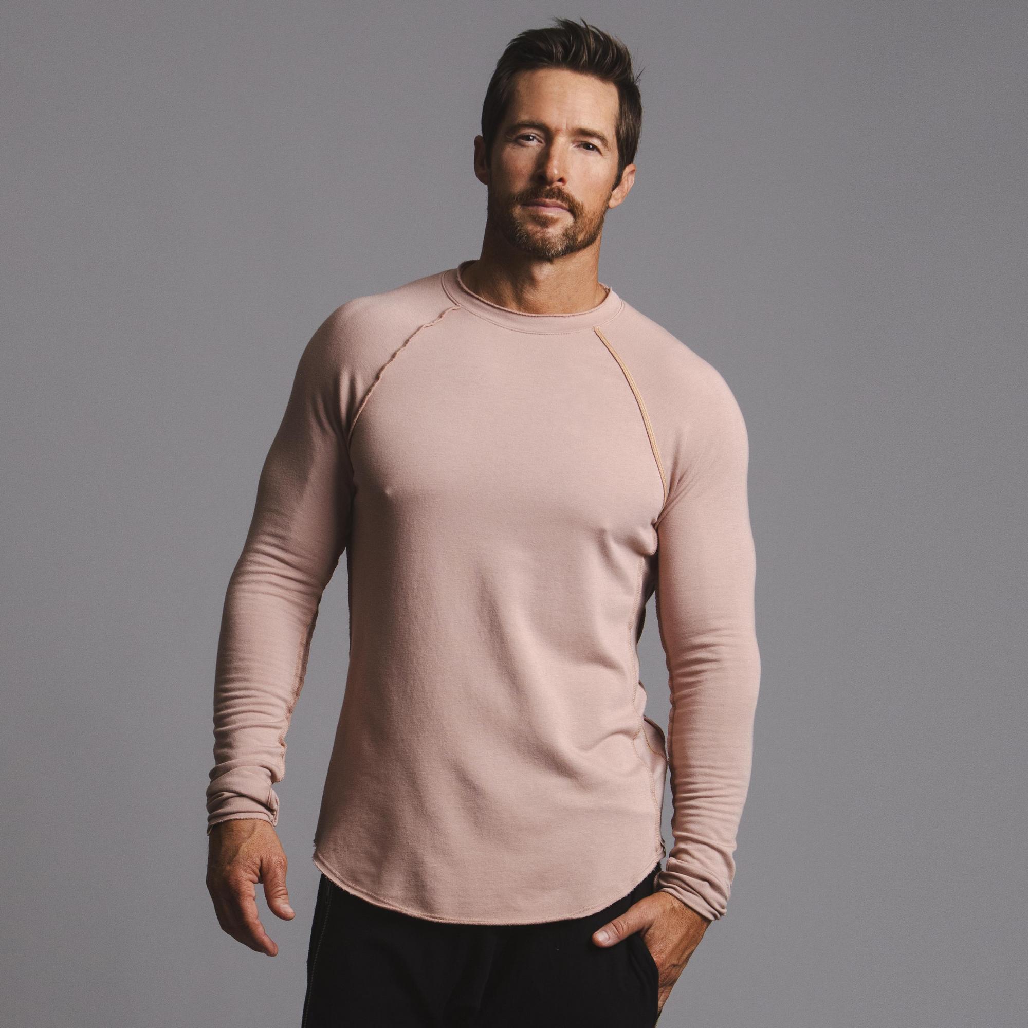 Male modeling pink long sleeve raglan