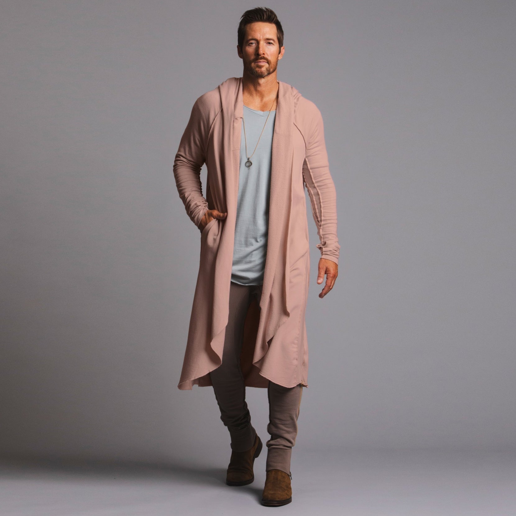 Male modeling pink kairos duster
