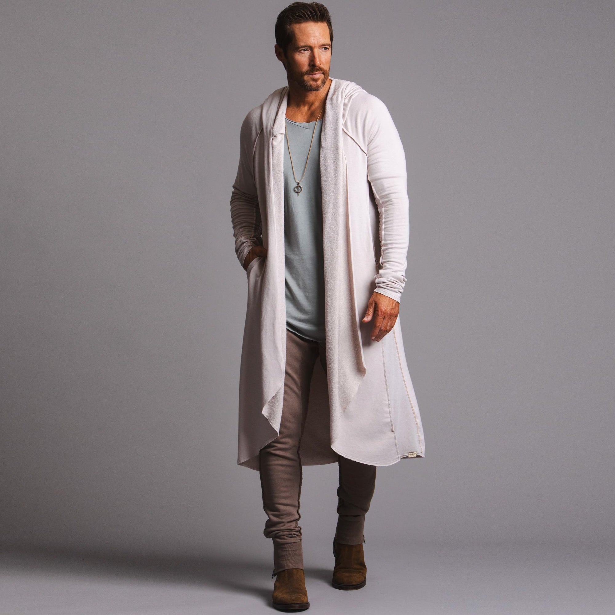 Male modeling white kairos duster