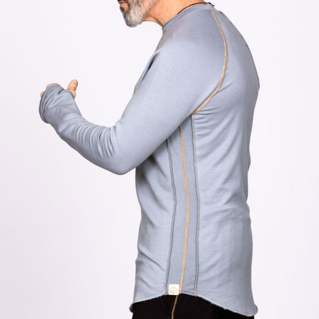 Male modeling light blue long sleeve raglan