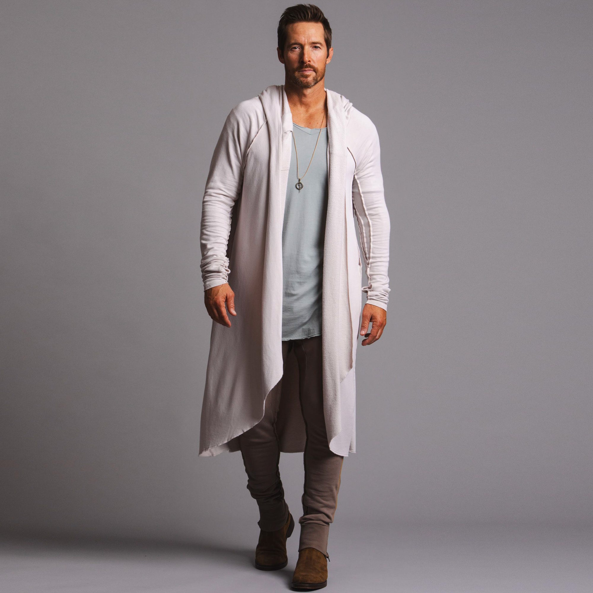 Male modeling white kairos duster